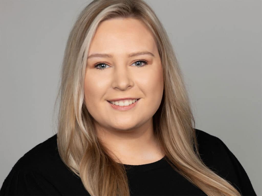 introvert woman smiling for a professional business headshot